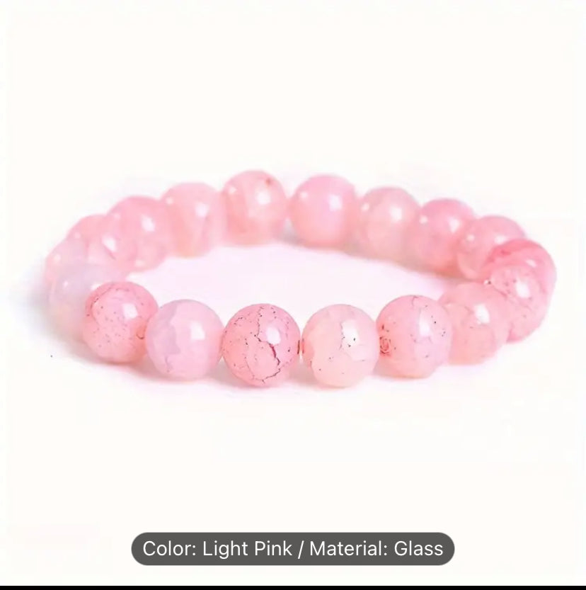Rose Quartz light pink crack glass looking stone bead bracelet.