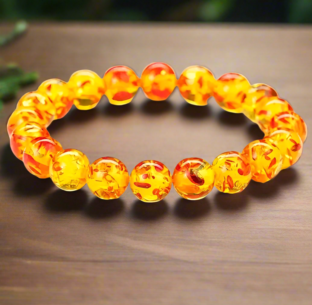 Yellow and orange bead bracelet.